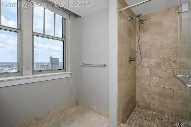 525 W Lafayette Blvd Unit 19C, Detroit, MI 48226 - full bath featuring a tile shower, plenty of natural light, and tile patterned floors