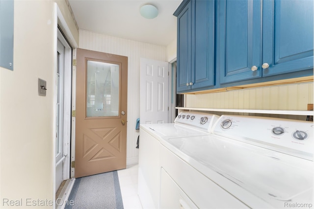 5320 Leland St, Brighton, MI 48116 - laundry area with cabinet space, washing machine and clothes dryer, and light tile patterned floors