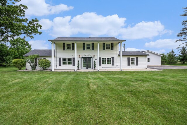 6170 Gregory Rd, Dexter, MI 48130 - back of house with a yard and a patio