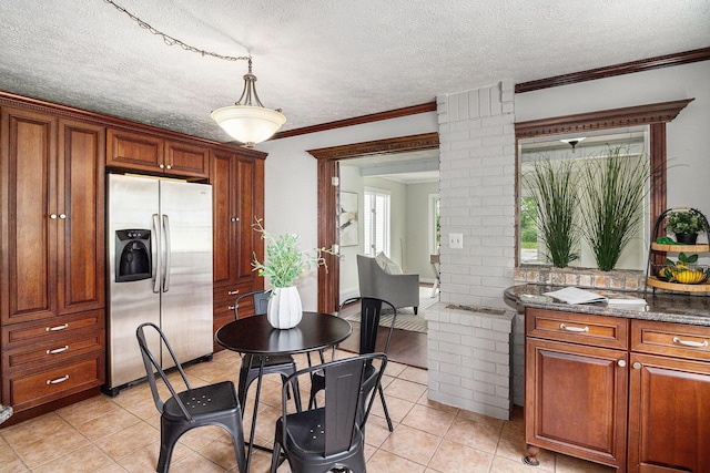 6170 Gregory Rd, Dexter, MI 48130 - dining room with light tile patterned floors, ornamental molding, and a textured ceiling