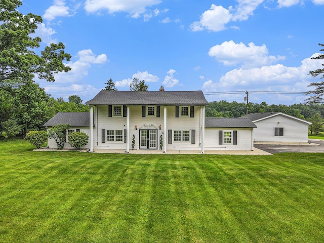 6170 Gregory Rd, Dexter, MI 48130 - rear view of house with a yard and a patio area