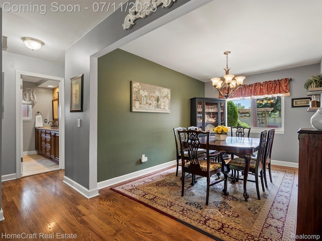7363 Provincial Rd, Canton, MI 48187 - dining space featuring a chandelier and wood finished floors