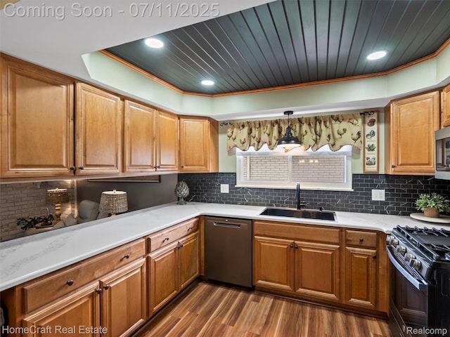 7363 Provincial Rd, Canton, MI 48187 - kitchen featuring appliances with stainless steel finishes, wood finished floors, light countertops, backsplash, and brown cabinetry