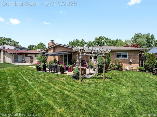 7363 Provincial Rd, Canton, MI 48187 - rear view of house featuring brick siding, a pergola, and a patio area