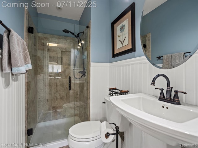 7363 Provincial Rd, Canton, MI 48187 - full bath featuring a wainscoted wall, a shower stall, and a decorative wall