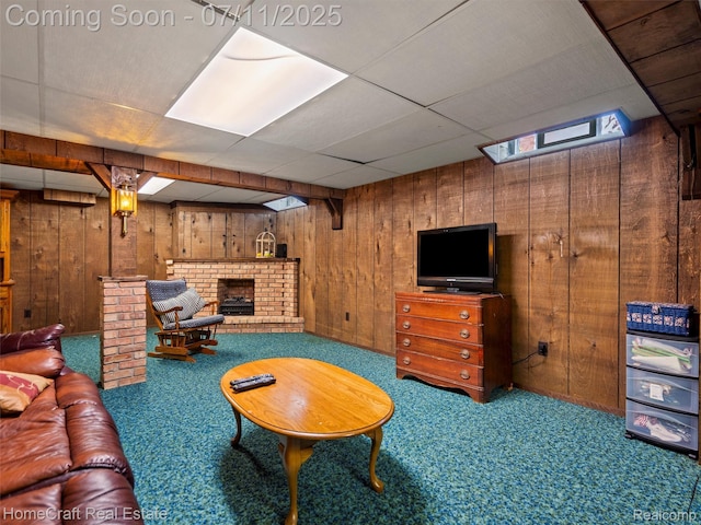 7363 Provincial Rd, Canton, MI 48187 - living room with wood walls, carpet floors, a fireplace, and a drop ceiling