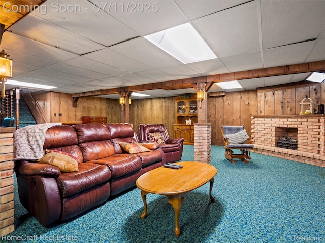 7363 Provincial Rd, Canton, MI 48187 - carpeted living area with wood walls and a brick fireplace