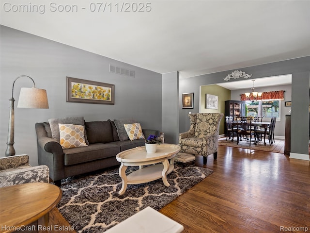 7363 Provincial Rd, Canton, MI 48187 - living room featuring a chandelier and wood finished floors