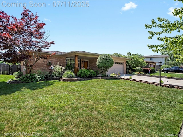 7363 Provincial Rd, Canton, MI 48187 - view of front of property featuring driveway, an attached garage, and brick siding