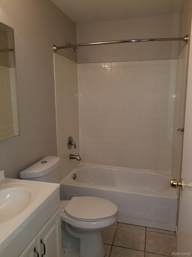 203 W Columbia Ave, Troy, MI 48340 - bathroom featuring washtub / shower combination, vanity, and tile patterned flooring