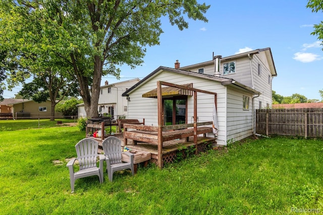 927 Piper Dr, Saginaw, MI 48604 - rear view of house with a fenced backyard