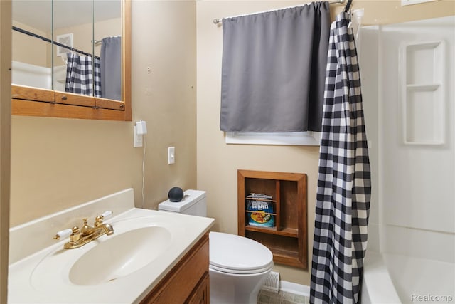 927 Piper Dr, Saginaw, MI 48604 - bathroom featuring vanity and shower / bath combo with shower curtain