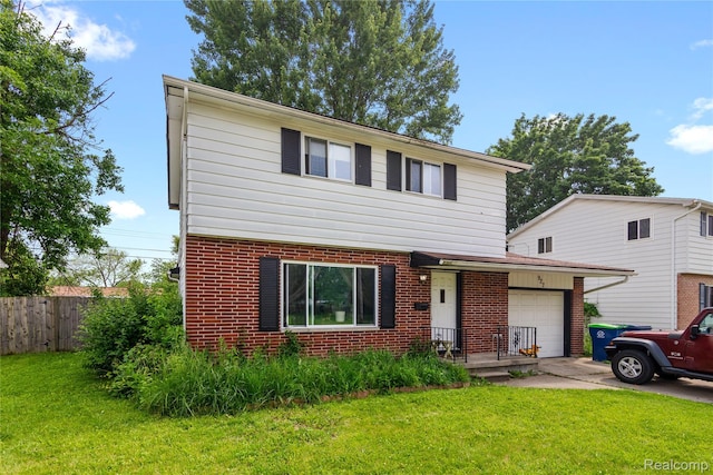 927 Piper Dr, Saginaw, MI 48604 - colonial house featuring a garage, brick siding, and concrete driveway
