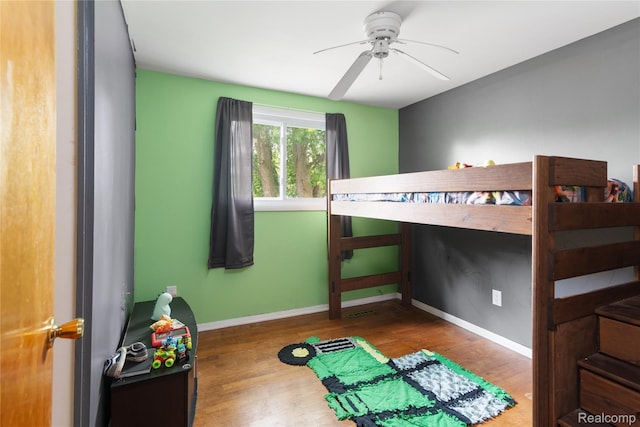 927 Piper Dr, Saginaw, MI 48604 - bedroom with wood finished floors and baseboards