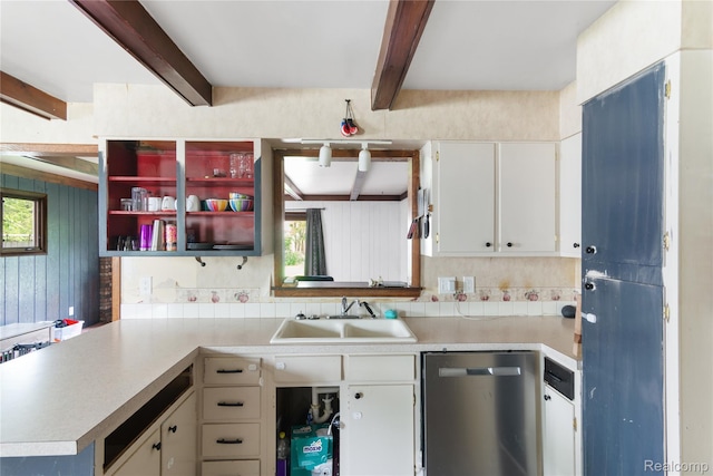 927 Piper Dr, Saginaw, MI 48604 - kitchen with stainless steel dishwasher, beam ceiling, light countertops, white cabinets, and open shelves