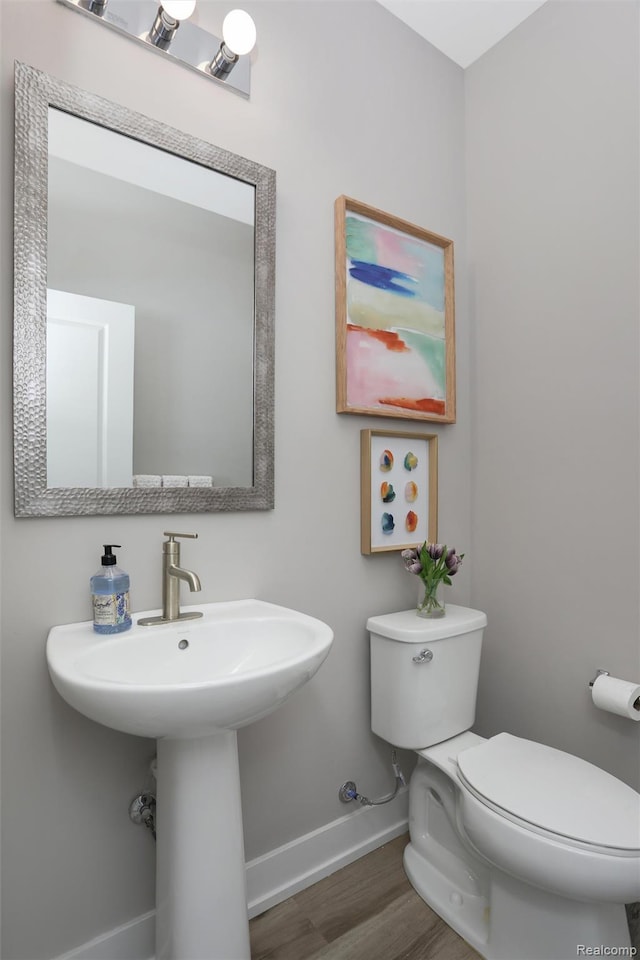 4837 Lismore Ln, Troy, MI 48085 - half bath featuring baseboards and wood finished floors