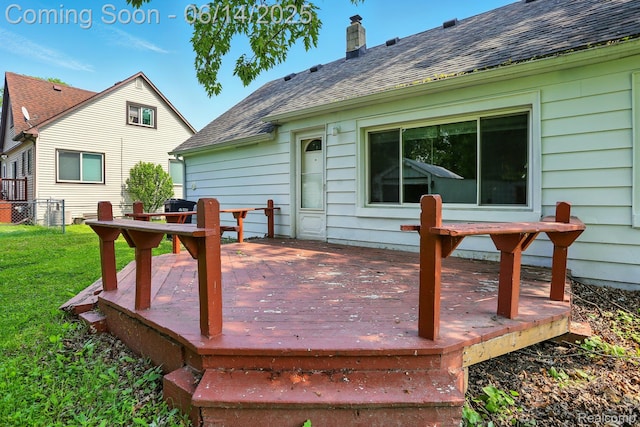2121 Chesley Dr, Sterling Heights, MI 48310 - wooden deck with a lawn