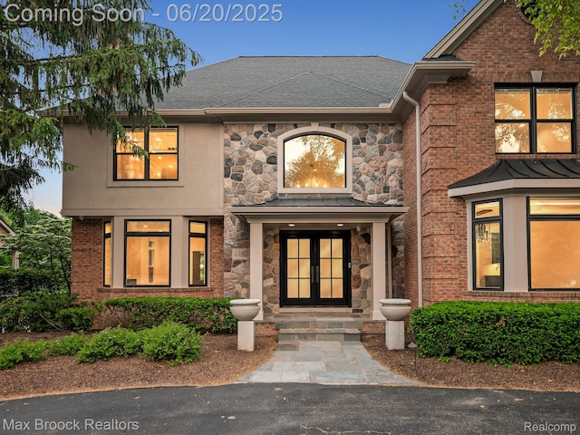 4331 Spruce Hill Ln, Birmingham, MI 48301 - view of front of house featuring stone siding and roof with shingles