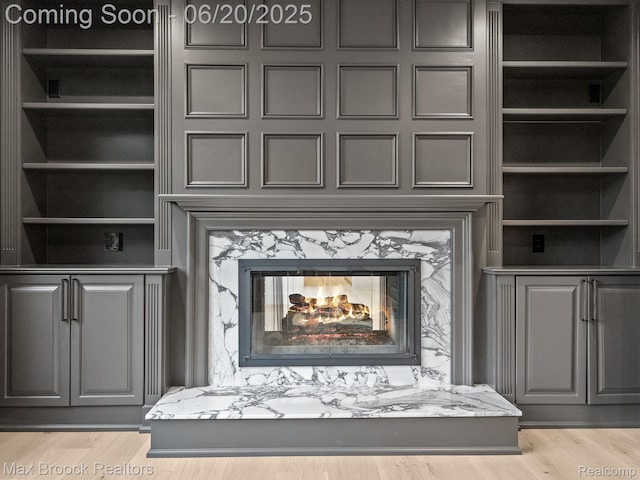 4331 Spruce Hill Ln, Birmingham, MI 48301 - detailed view of a high end fireplace and wood finished floors