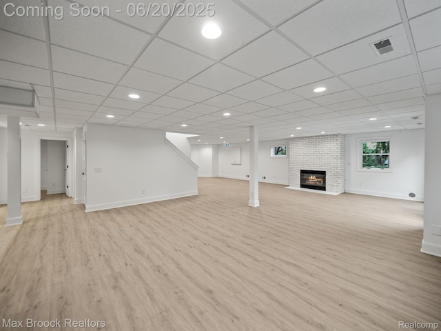 4331 Spruce Hill Ln, Birmingham, MI 48301 - unfurnished living room featuring light wood-type flooring, a fireplace, and recessed lighting