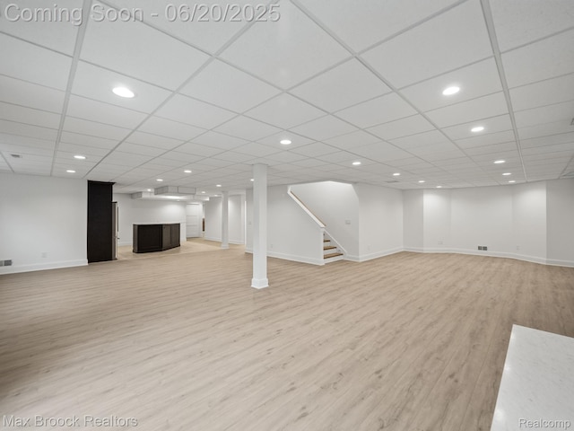 4331 Spruce Hill Ln, Birmingham, MI 48301 - finished below grade area featuring light wood finished floors, stairs, recessed lighting, and a paneled ceiling