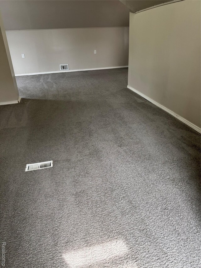 7821 Mead St, Dearborn, MI 48126 - spare room featuring dark carpet and baseboards