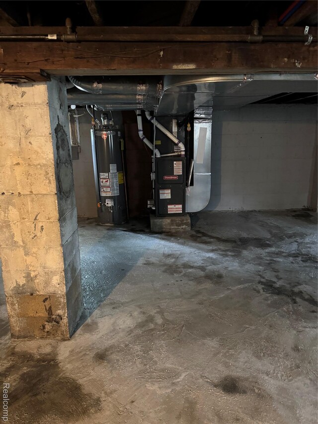 7821 Mead St, Dearborn, MI 48126 - unfinished basement featuring gas water heater and heating unit