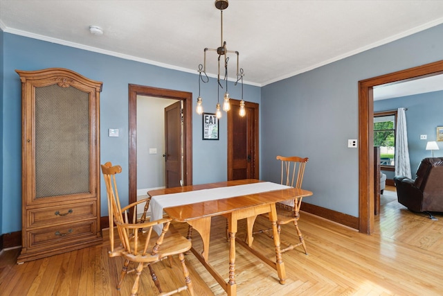238 E E Main St, Milan, MI 48160 - dining space with light wood-style floors and ornamental molding