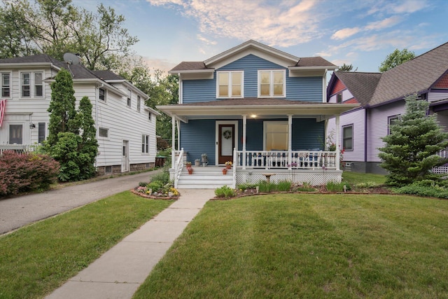 238 E E Main St, Milan, MI 48160 - view of front of property with a porch and a front yard