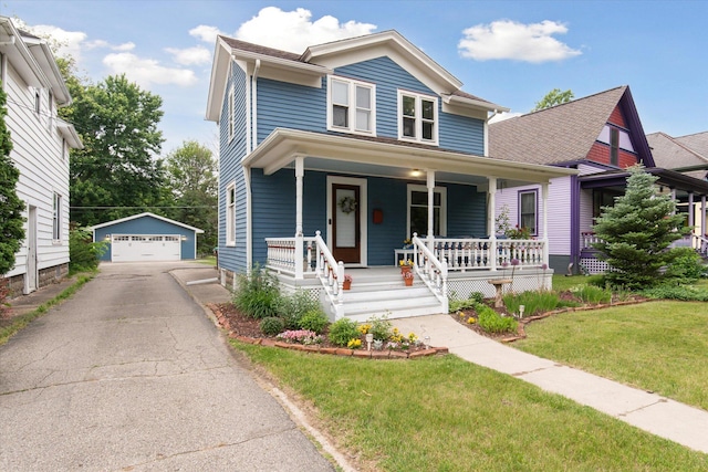 238 E E Main St, Milan, MI 48160 - view of front of house with a detached garage, an outdoor structure, covered porch, and a front lawn