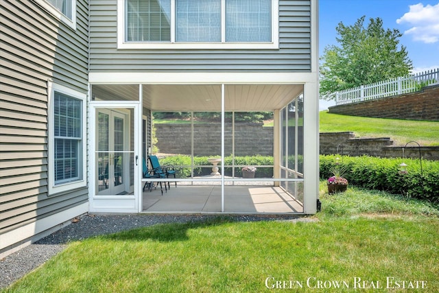 5173 Olsen Springs Ct Unit 13, Wyoming, MI 49509 - view of patio / terrace featuring a sunroom