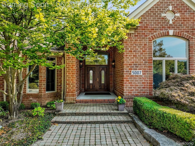 5007 Rockaway Ln, Clarkston, MI 48348 - doorway to property featuring brick siding and french doors