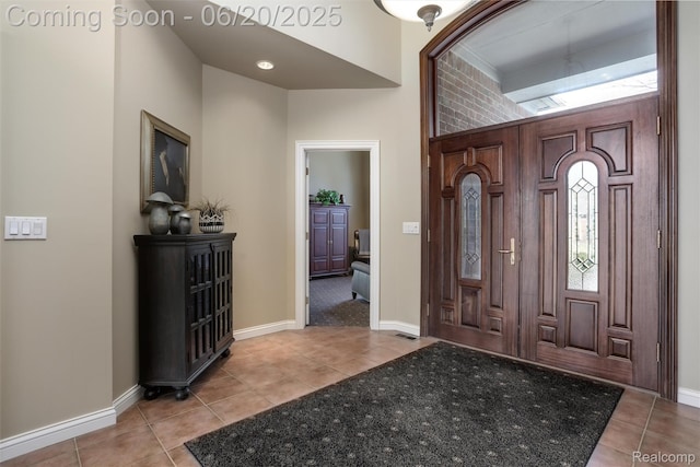 5007 Rockaway Ln, Clarkston, MI 48348 - entrance foyer featuring light tile patterned floors and a high ceiling