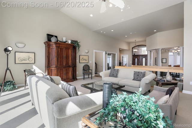 5007 Rockaway Ln, Clarkston, MI 48348 - living area with high vaulted ceiling, light colored carpet, ceiling fan, recessed lighting, and decorative columns