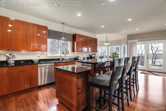 5007 Rockaway Ln, Clarkston, MI 48348 - kitchen featuring dishwasher, dark wood-style flooring, a kitchen island, recessed lighting, and hanging light fixtures
