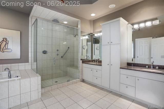 5007 Rockaway Ln, Clarkston, MI 48348 - bathroom featuring a shower stall, tile patterned floors, vanity, a bath, and recessed lighting