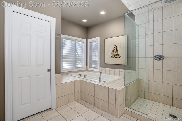 5007 Rockaway Ln, Clarkston, MI 48348 - bathroom with a tub with jets, a tile shower, tile patterned floors, and recessed lighting