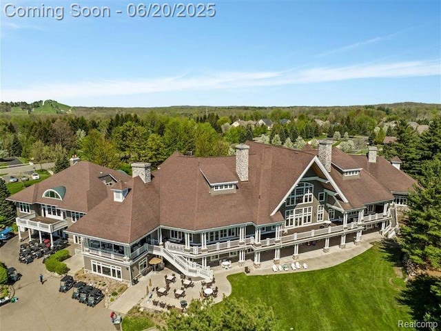 5007 Rockaway Ln, Clarkston, MI 48348 - view of subject property with a heavily wooded area