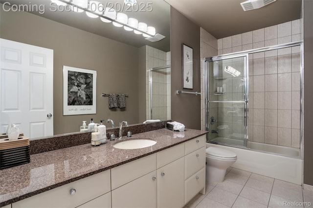 5007 Rockaway Ln, Clarkston, MI 48348 - bathroom with tile patterned floors, vanity, and shower / bath combination with glass door