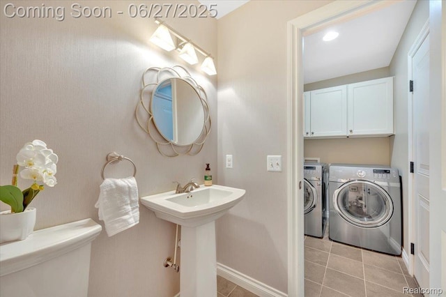 240 Red Oak Ln, Rochester Hills, MI 48307 - bathroom with washer and clothes dryer and tile patterned floors