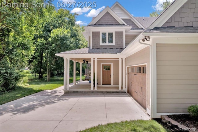 240 Red Oak Ln, Rochester Hills, MI 48307 - doorway to property featuring a shingled roof, a porch, and a lawn