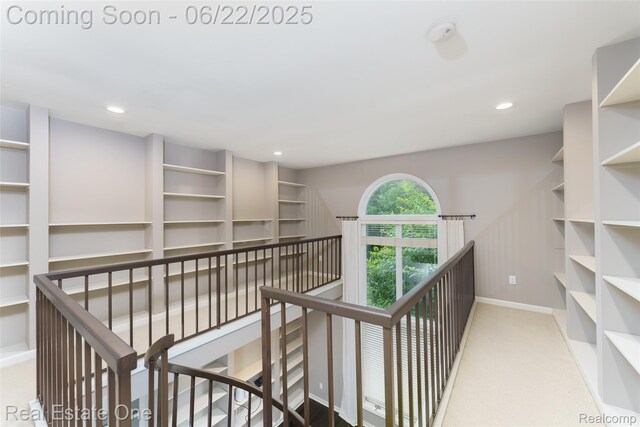 5258 Hidden Pines Dr, Brighton, MI 48116 - hall featuring an upstairs landing, recessed lighting, built in features, and carpet flooring