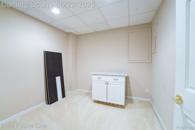 5258 Hidden Pines Dr, Brighton, MI 48116 - empty room with a drop ceiling and light colored carpet