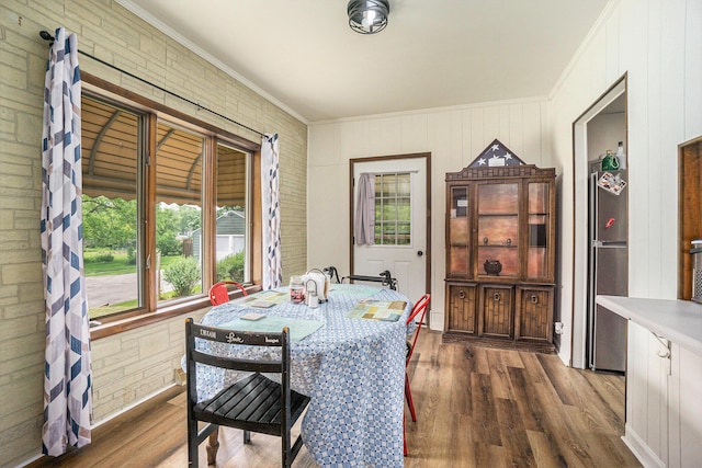 59 Dunning Ave, Battle Creek, MI 49037 - dining room featuring crown molding and dark wood finished floors