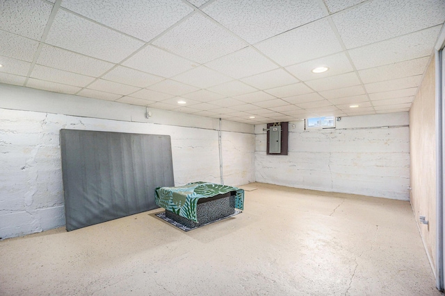 59 Dunning Ave, Battle Creek, MI 49037 - below grade area with electric panel, a drop ceiling, recessed lighting, and concrete block wall