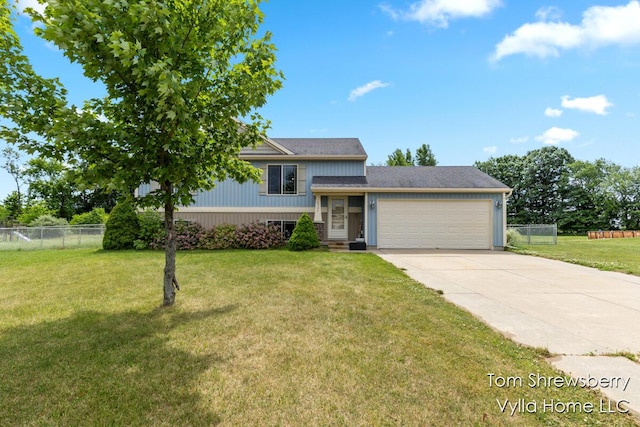 16304 Trent Ridge Dr, Cedar Springs, MI 49319 - split level home featuring a garage and driveway