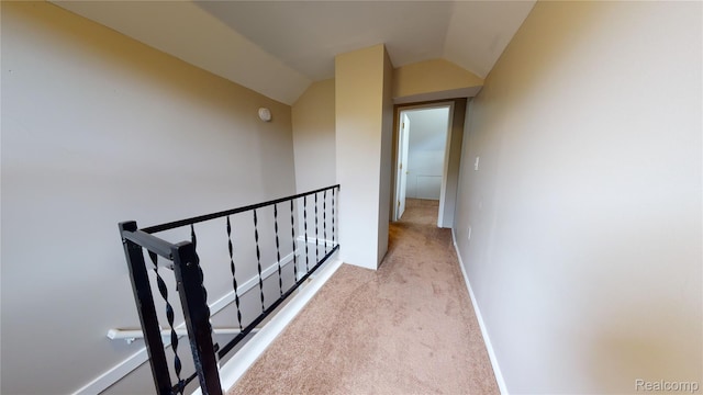 929 Kettering Ave, Pontiac, MI 48340 - corridor with carpet, lofted ceiling, and an upstairs landing