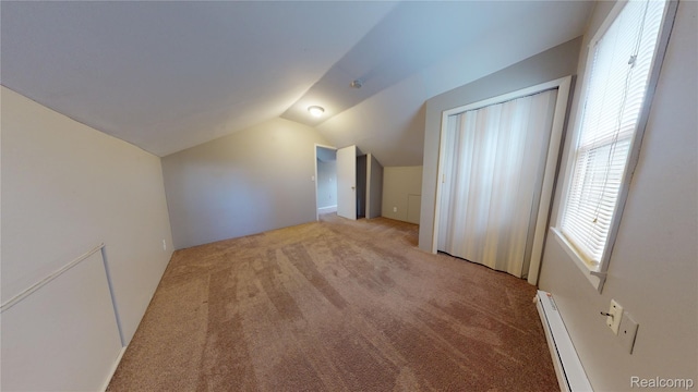 929 Kettering Ave, Pontiac, MI 48340 - additional living space featuring a baseboard radiator, light carpet, and lofted ceiling