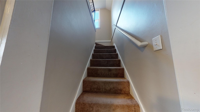 929 Kettering Ave, Pontiac, MI 48340 - staircase featuring vaulted ceiling and carpet floors