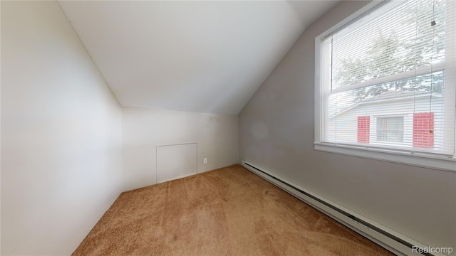 929 Kettering Ave, Pontiac, MI 48340 - additional living space featuring a baseboard heating unit, lofted ceiling, and carpet floors